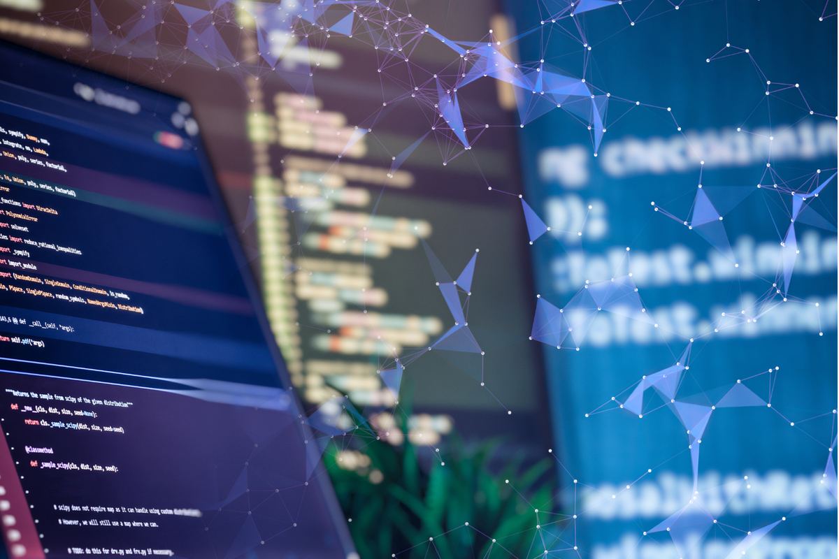 Laptop screen with colorful code, blurry text in background. Blue and purple geometric overlay, tech-focused atmosphere.